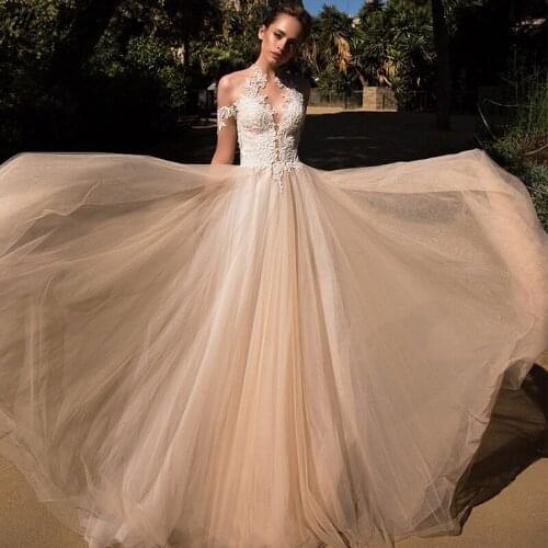 Magic Awn Boho Champagne Wedding Dresses Lace Appliques Illusion A-Line Beach Bridal Gowns Customized Robe De Mariee 2021