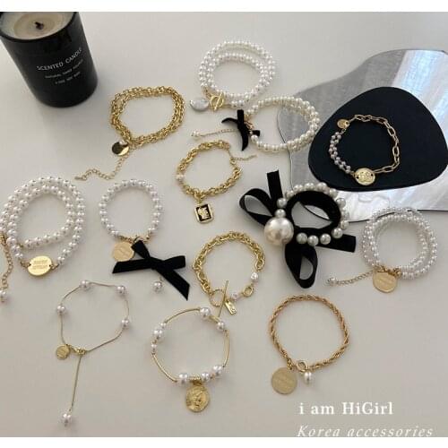 Korean Retro Pearl Necklace Personality Simple Bracelet European and American New Bow Knot Cold Wind Sweater Chain