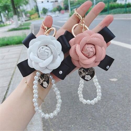 Luxury Black Camellia Genuine Leather Flower Keychain Letter Umbrella Pendant Car Key Chain Ring Pendant For Bag