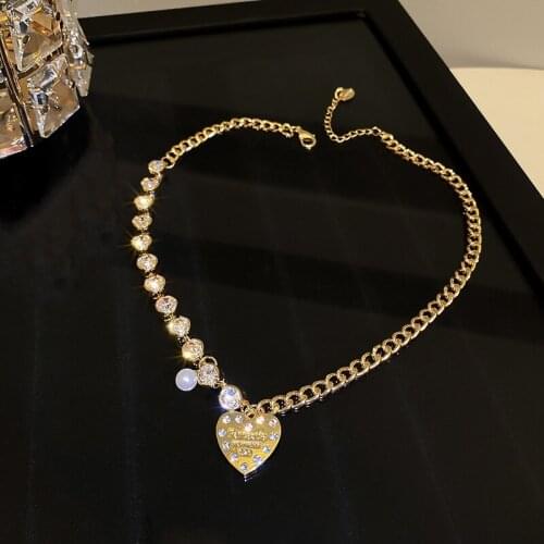 Simple personality pearl heart shape necklace South Korea East gate web celebrity temperament cold wind collarbone chain woman