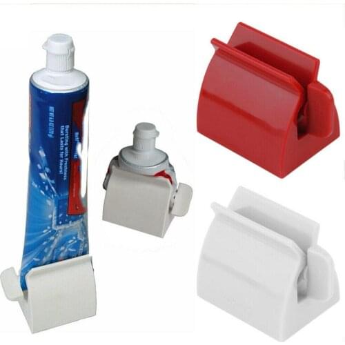 Creative Bath Rolling Tube Toothpaste Squeezer ABS Toothpaste Dispenser Seat Holder Stand New Hot