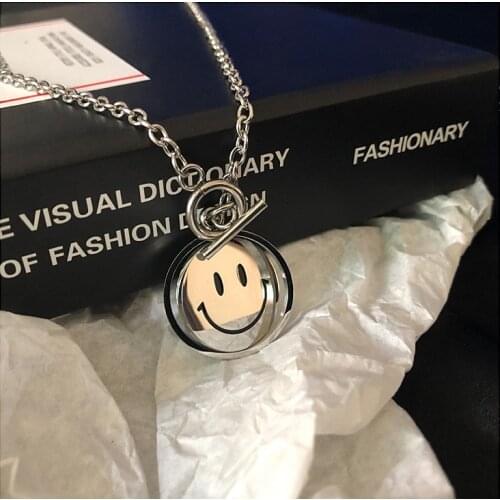 Rotating smiley crying face necklace men and women street expression ins hip hop fashion personality double-sided cool