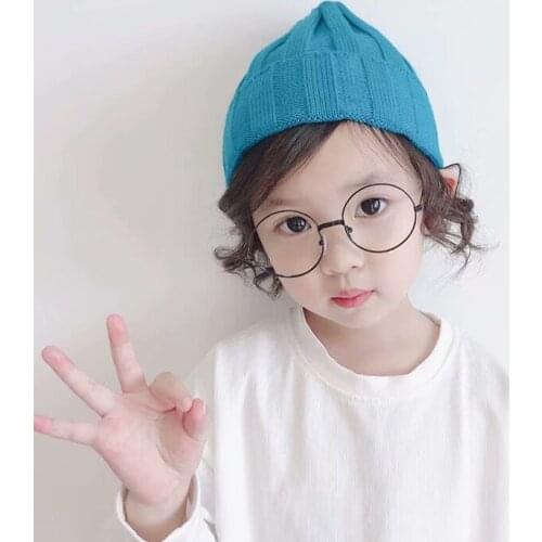 Autumn and winter solid color childrens woolen hats for boys and girls baby hoods knitted hats warm earmuffs Beanie hat