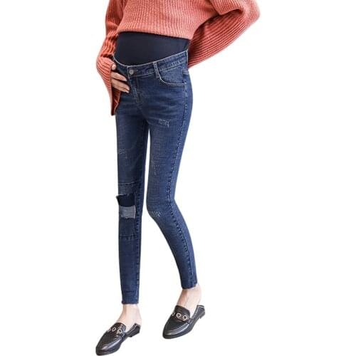 Spring and summer low waist explosion models maternity pants maternity wear casual pants feet stomach lift pants hole jeans