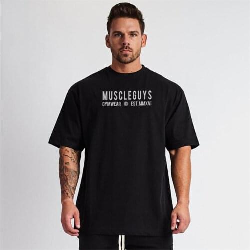 Muscleguys Brand Oversized T-shirt Men Dropped Shoulder Half Sleeve Fitness T Shirt Summer Loose Gym Clothing Bodybuilding Tees