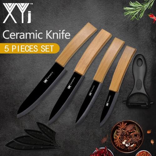 XYj Bamboo Handle Kitchen Knife Cooking Accessories Black Blade Ceramic Knife Cooking Kitchen Tools Set 3" 4" 5" 6" + Peeler