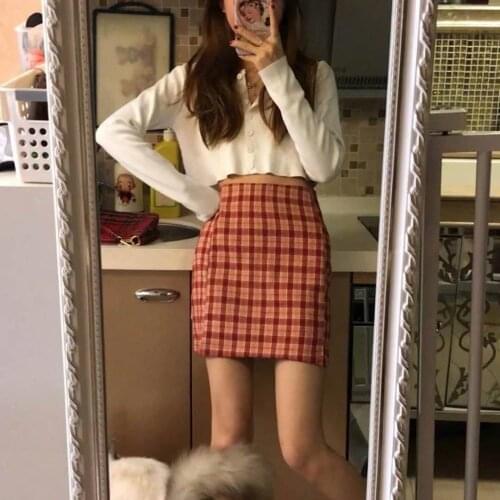 Stylish skirt set womens fall 2021 Korean version of high-waisted grid skirt long-sleeved knitted cardigan top two-piece set