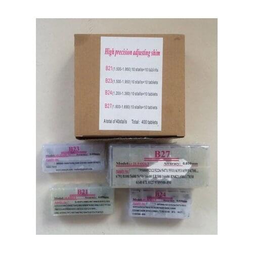 Diesel fuel common rail injector adjusting spacer shims for denso