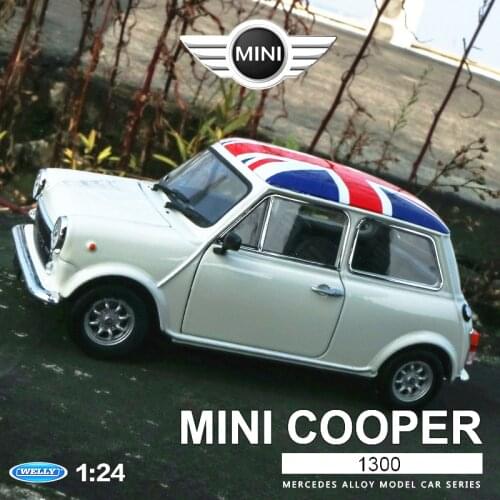 Welly 1:24 Mini Cooper 1300 white car alloy car model simulation car decoration collection gift toy Die casting model boy