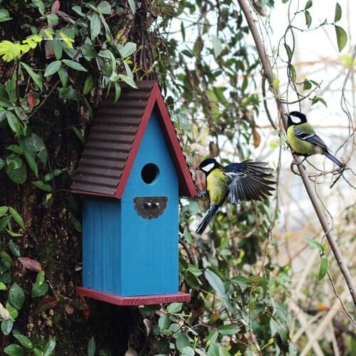 Decorative wooden colored birdhouse