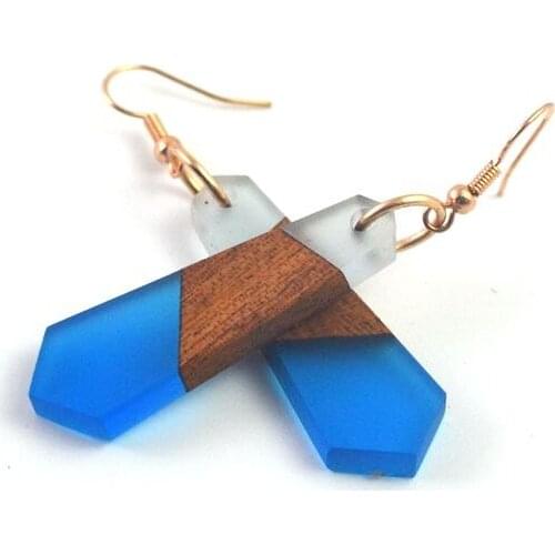 Long geometric fashionable female earrings, with a variety of clothing