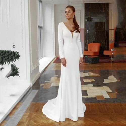 UZN Elegnat Deep Sweetheart Satin Bridal Gowns Sexy Backless Beading Wedding Dress Long Sleeves Brides Dresses Vestido De Novia
