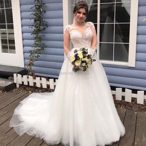 Unique Lace Applique Long Sleeves Wedding Dresses with Buttons Back 2020 A Line White Scoop Neck Bridal Gowns Vestido de Noiva