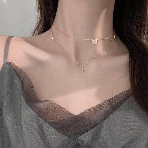 Female Korean version of simple niche design sense cross tassel clavicle chain 2021 new flashing diamond double layer butterfly