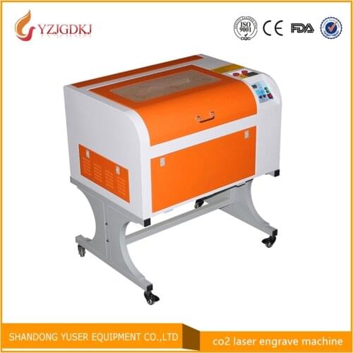 4060 / 50w mini low version of the laser engraving cutting machine CO2 laser engraving machine