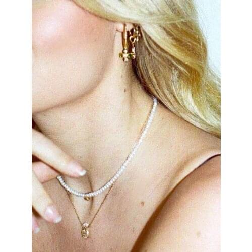 S925 silver flower pendant earrings European and American fashionable retro green zircon earrings for women