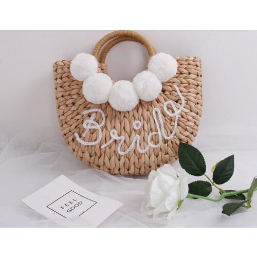 New semi-circular hollow straw bag colorful hair ball fairy woven bag shoulder portable super fire beach Messenger bag Character