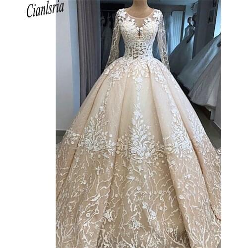 Champagne Illusion Back Long Sleeve Saudi Arabic Ball Gown Wedding Dress Scoop Floral Appliques Lace Dubai Bridal Gown