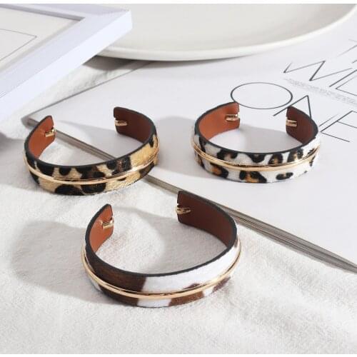 MICHAEL KENDRA Rigid Bracelets
