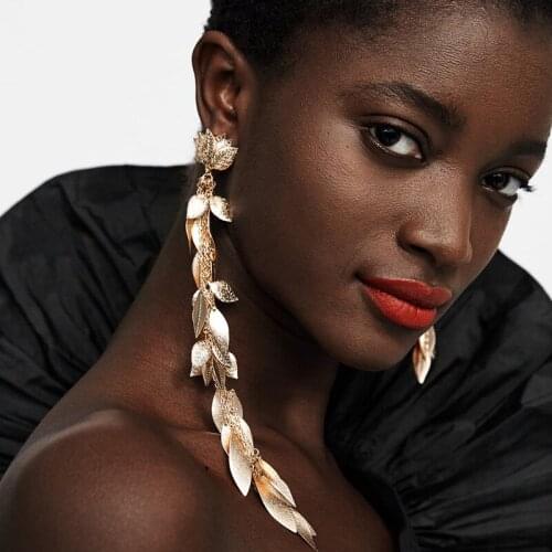 Europe and the United States exaggerated brand alloy flower asymmetrical metal long tassel earrings, womens fashion jewelry