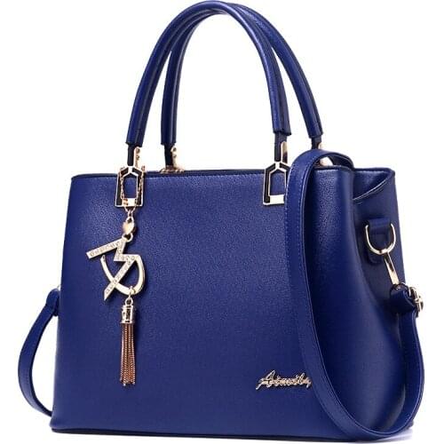 2020 New Wild Bag Ladies Handbag Middle-aged Women Shoulder Messenger Killer Bag Double root Tassel pendant Simple