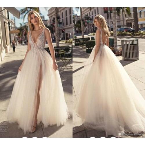 2019 Bohemian Wedding Dresses Deep V Neck Lace Beaded Sequins Side Split Backless Beach Wedding Gown Court Train