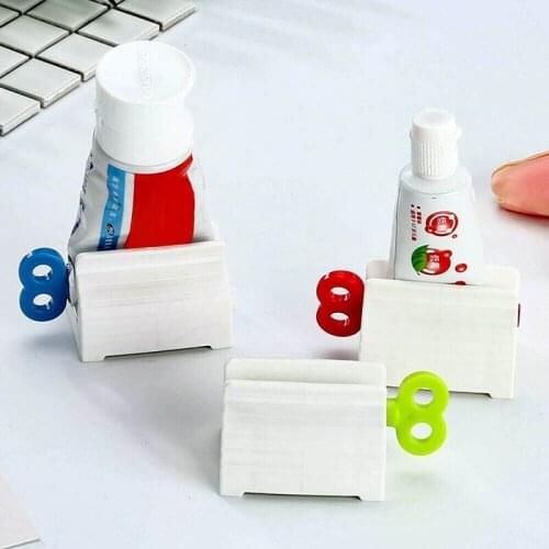 Toothpaste Squeezer squeezing Tooth Paste Dispenser Tube cosmetics Facial Cleaner Press Rolling Holder Bathroom Accessories