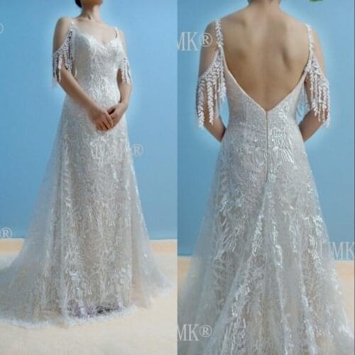 UMK Sexy Backless Lace Beach Wedding Dress Bohemia Vestido De Noiva V Neck Tassel Spaghetti Straps Wedding Gowns