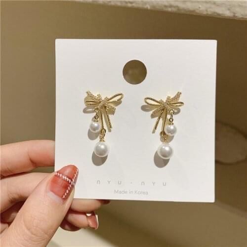 Korea New Design Fashion Jewelry Exquisite Copper Inlaid Zircon Bow Earrings Elegant Women Pearl Ball Party Earrings