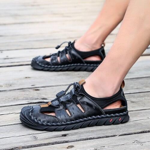 Large size sandals mens waterproof beach shoes Baotou leather dad shoes anti-collision anti-skid lazy shoes soft bottom pedal