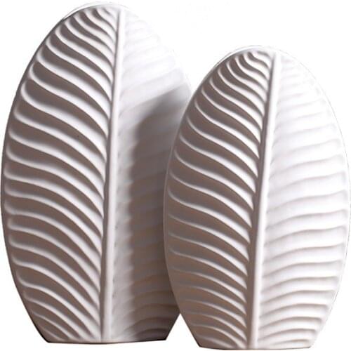 European Modern Fashion Ceramic White Leaf Vase For Home Decorative Wedding Decoration Tabletop Art Crafts Bottle