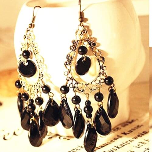 New 2020 fashion retro hollow hollow tassel long earrings European and American black water drop exaggerated female earrings