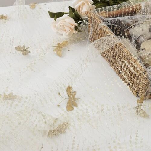 Nylon gold thread butterfly embroidery net gauze mesh fabric gold black childrens dress wedding lace fabric