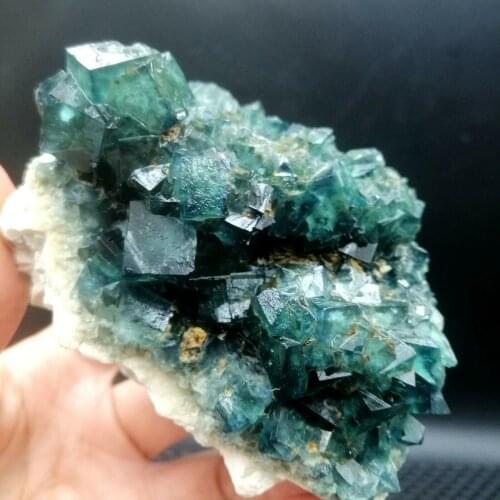 Natural green fluorite crystal octahedral rock samples