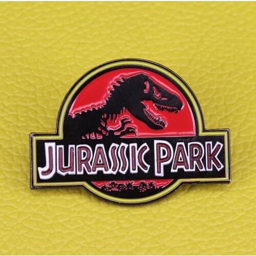 "Welcome to Jurassic Park" lapel pin Show the world how much you dig this dino classic dinosaur film