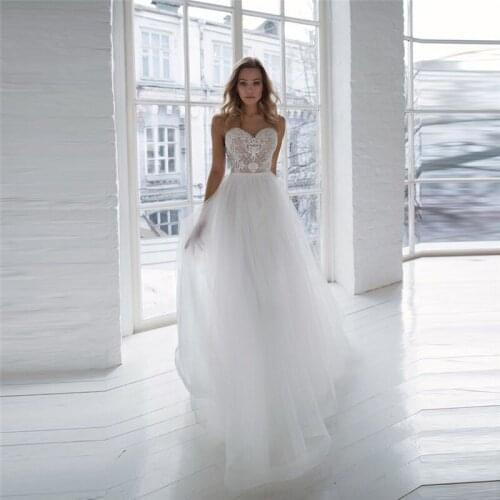 Robe De Mariage Sheer Scoop Neck Tulle A-Line Wedding Dresses Lace Appliques 2021 Lower Back Garden Bride Dress Wear Gowns