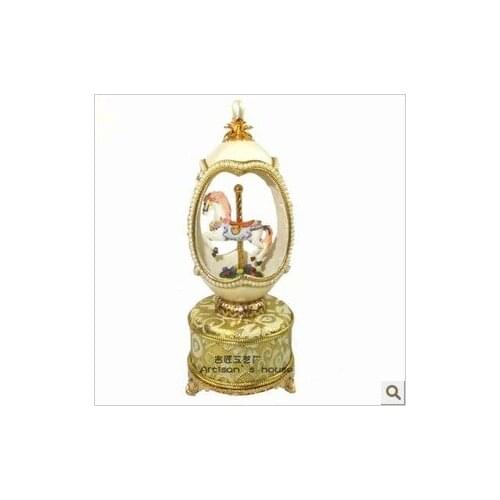 Golden Horse amusement base rotary egg music box to send his girlfriend a birthday Christmas preferred furnishings collection