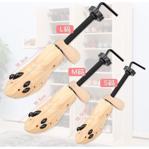 Expansion of men and women shoes machine can adjust the wooden stand to hold big shape high-heeled shoes with flat sole