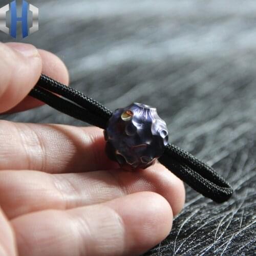 Titanium Alloy Knife Beads EDC Handmade Original Pure Titanium Solid Paracord Bead Knife Drop Beads Universe Pit Surface