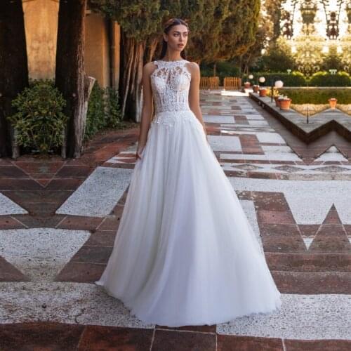 Sexy Wedding Dresses Lace Appliques with Tulle Backless Wedding Gowns Sleeveless Bridal Dress vestido de noiva Floor Length