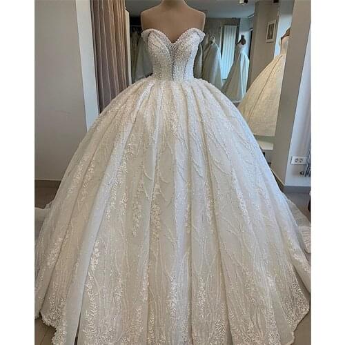 Exquisite Stones Beads Ball Gown Wedding Dress 2021 Vestido De Noiva Sexy Backless Sweetheart Neck Wedding Bridal Gowns