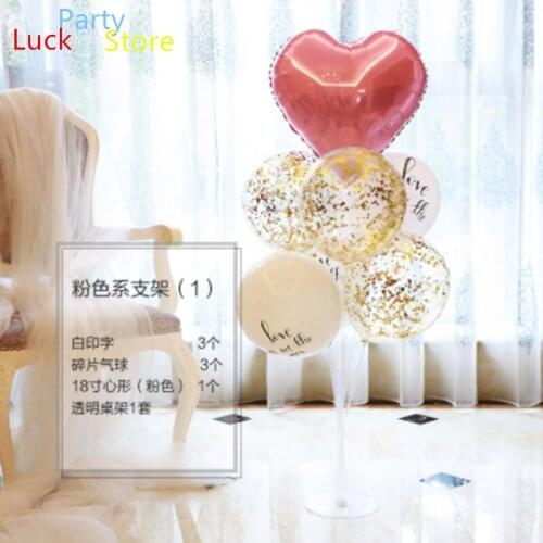 Romantic pink wedding room floor table floating balloon decoration first year old baby birthday child party bracket scene layout