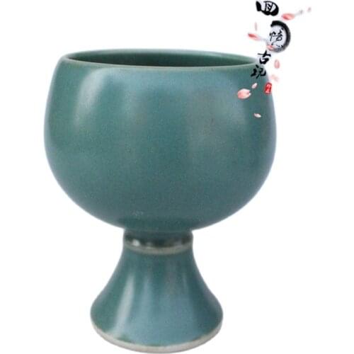 Ceramic wine cup with antique dragon glaze