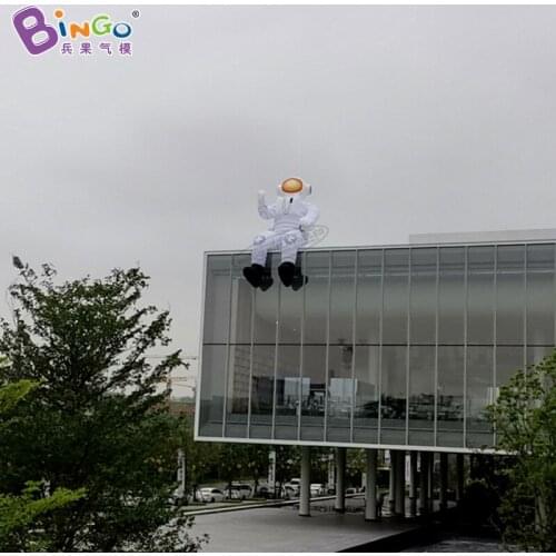 Custom Made 8 Meters Tall Show Supplies Large Inflatable Sitting Astronaut On The Building for Decoration Toys BG-C0520