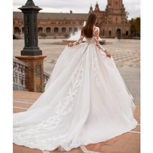 Vintage Long Sleeve A-Line Shear Lace Wedding Dresses Ivory Button Back Tulle Sweep Train Robes De Mariée Bridal Gown For Women