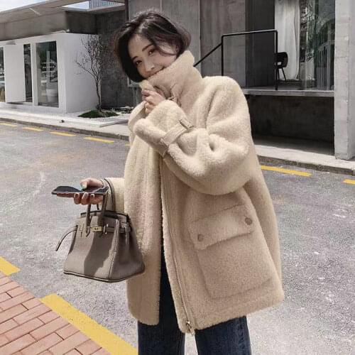 Bella Philosophy Women's Natural Sheepskin Coats