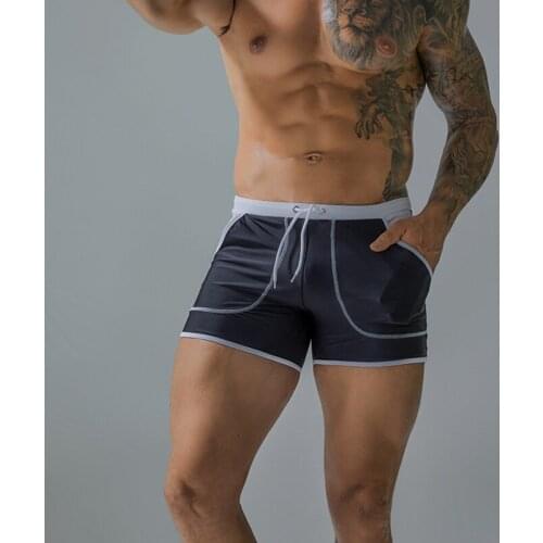 New Trendy Mens Fashion Big Size Quick-Drying Boxer Swimming Trunks Solid Color Beach Seaside Male Youth Pop Pants Summer