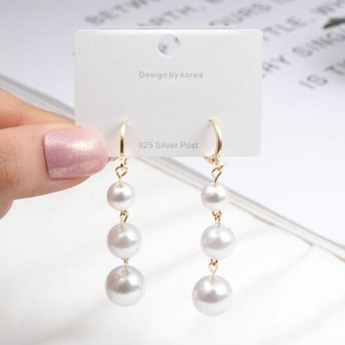Temperament Hong Kong Style Red Pearl White Pearl Long Tassel Simple Wild Earrings Trendy Earrings New Trends For 2021