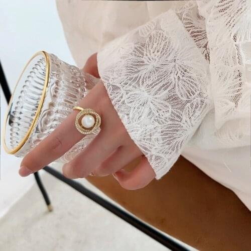 U-Magical Luxury Bling Bling CZ Zircon Hollow Ring for Women Gold Metallic Imitation Pearl Twist Rope Index Finger Ring Jewelry