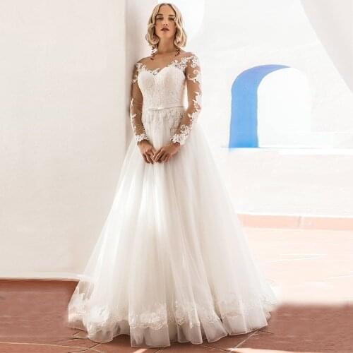 Charming Princess Wedding Dress 2021 A-Line Sheer Neck Long Sleeve Lace Appliques Button Sweep Train Bride Gown Robe De Mariée